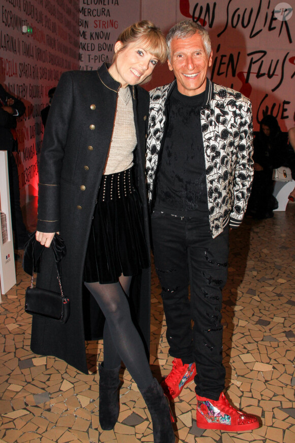 Nagui et sa femme Mélanie Page lors du vernissage de l'exposition consacrée à l'oeuvre et l'imaginaire de Christian Louboutin "l'Exhibitionniste' (L'Exibition[niste]) au Palais de la Porte Dorée, à Paris, France, le 24 février 2020.