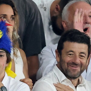 Patrick Bruel - People dans les tribunes lord du match d'ouverture de la Coupe du Monde de Rugby France 2023 avant le match de la Poule A entre la France et la Nouvelle-Zélande au Stade de France à Saint-Denis le 8 septembre 2023. © Dominique Jacovides/Bestimage 