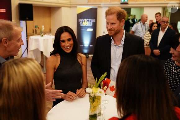 Le prince Harry, duc de Sussex et Meghan Markle, duchesse de Sussex, à la réception de l'IG25 et de l'Équipe du Canada à l'hôtel Hilton lors des Jeux Invictus à Düsseldorf, Allemagne, le vendredi 15 septembre 2023. 