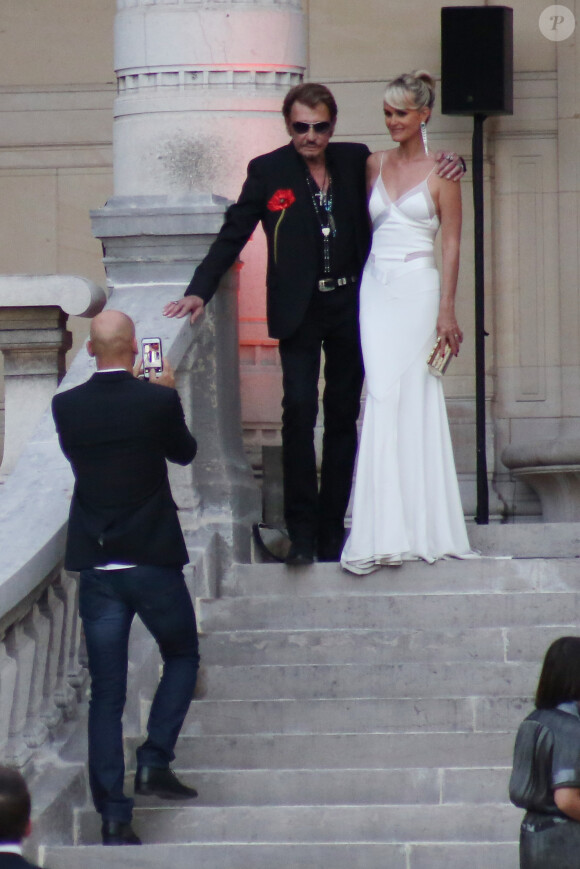 Johnny Hallyday et sa femme Laeticia Hallyday à la soirée "Vogue Paris Foundation Gala" au palais Galliera à Paris, le 6 juillet 2015.