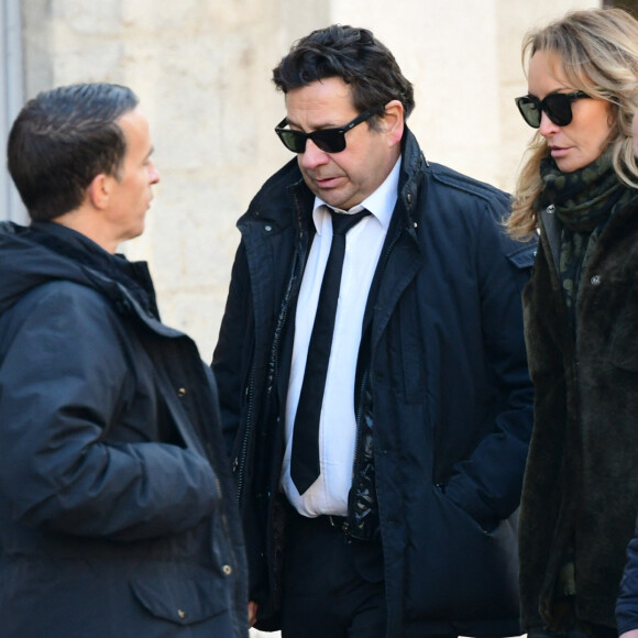 Laurent Gerra et sa femme Christelle Bardet - Obsèques de Gérard Collomb en la cathédrale Saint-Jean à Lyon le 29 novembre 2023. © Romain Doucelin/Bestimage
