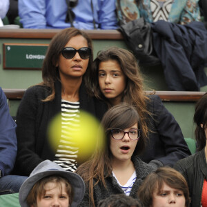 Karine Le Marchand et sa fille Alya, Stéphane Plaza - People aux Internationaux de France de tennis de Roland Garros à Paris, le 29 mai 2014. 