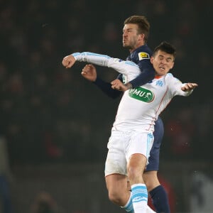 "Je me retire. Parti. Retraité du football masculin", ajoute l'ancien Marseillais, qui ne veut plus rien avoir à faire avec le monde du football
 
David Beckham, Joey Barton - Huitieme de finale de la Coupe de France de football entre le PSG et l'Olympique de Marseille au Parc des Princes a Paris le 27 fevrier 2013. Le PSG a remporte le match sur le score de 2 buts a 0.