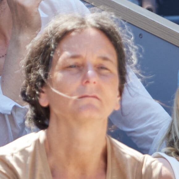 Calogero et son fils Pio en tribunes lors des Internationaux de France de tennis de Roland Garros 2023 à Paris, France, le 4 juin 2023. © Cyril Moreau/Bestimage 