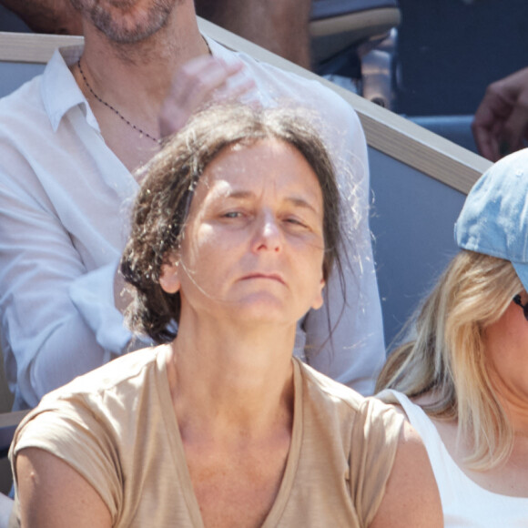 Calogero et son fils Pio en tribunes lors des Internationaux de France de tennis de Roland Garros 2023 à Paris, France, le 4 juin 2023. © Cyril Moreau/Bestimage 