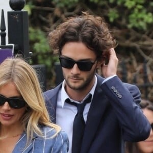 Sienna Miller et Oli Green assistent au tournoi de Wimbledon. Londres.