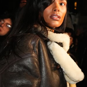 Tina Kunakey au défilé Kenzo collection homme automne/hiver 2024/2025 lors de la fashion week à Paris (PFW) le 19 janvier 2024.