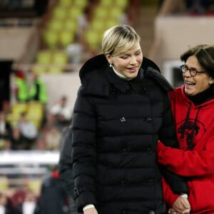 La princesse Charlene de Monaco, la princesse Stéphanie de Monaco - - La famille princière de Monaco lors du match de gala entre les Barbagiuans de Monaco et le FC Cirque au stade Louis II de Monaco le 22 janvier 2024. © Jean-François Ottonello / Nice Matin / Bestimage