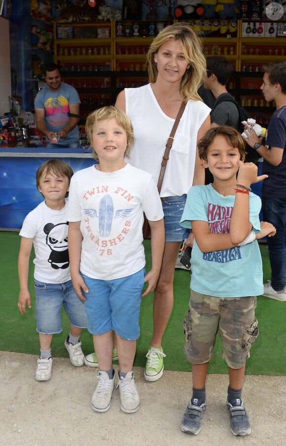 Info - Marc Lavoine et sa femme Sarah se séparent - Sarah Lavoine avec ses fils Milo, Roman et un ami - Inauguration de la Fête des Tuileries à Paris le 26 juin 2015.