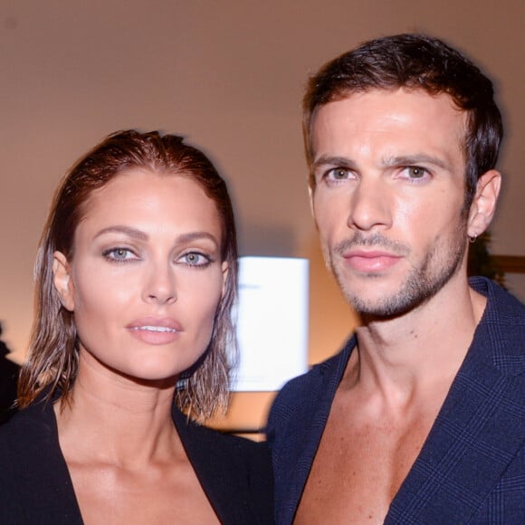 Exclusif - Caroline Receveur et son compagnon Hugo Philip - Les people dans l'espace Experience Immersive réservé aux VIP lors du Etam Live Show 2019 au Stade Roland Garros lors de la fashion week à Paris, le 24 septembre 2019. © Rachid Bellak/Bestimage