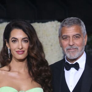Amal Clooney et son mari George Clooney - Photocall de la 2ème édition du gala annuel du musée de l'Académie à l'Academy Museum of Motion Pictures de Los Angeles, Californie, Etats-Unis, le 15 octobre 2022. 