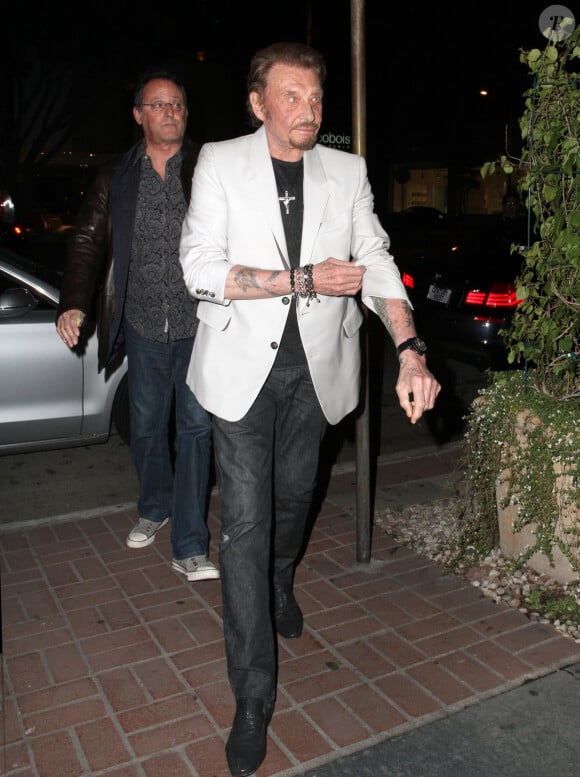 Johnny Hallyday et Jean Reno ont dine chez Madeo a West Hollywood, le 18 fevrier 2013.