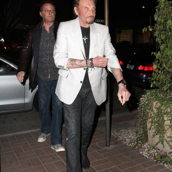 Johnny Hallyday et Jean Reno ont dine chez Madeo a West Hollywood, le 18 fevrier 2013.