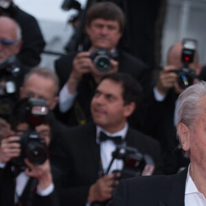 Alain Delon (Palme d'Or d'Honneur du 72ème festival de Cannes avec un badge Paris Match d'une ancienne couverture du magazine titrant "Alain Delon, mes deux amours, Rosalie et Anouchka) - Montée des marches du film "A Hidden Life" lors du 72ème Festival International du Film de Cannes. Le 19 mai 2019 