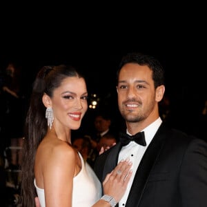 Iris Mittenaere et son fiancé Diego El Glaoui - Montée des marches du film " Le retour (Homecoming) " lors du 76ème Festival International du Film de Cannes, au Palais des Festivals à Cannes. Le 17 mai 2023 © Jacovides-Moreau / Bestimage