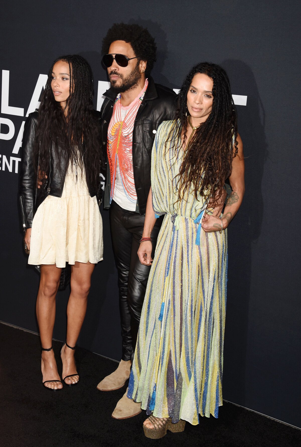 Photo : Zoë Kravitz et ses parents Lenny Kravitz et Lisa Bonet - People au  défilé Saint-Laurent à Hollywood le 10 février 2016. - Purepeople