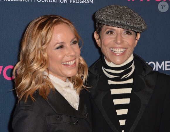 La décoration se veut par ailleurs "bohème et élégante", apprend-t-on également. 
Maria Bello et sa fiancée Dominique Crenn au photocall de la soirée "Women's Cancer Research Fund" à Los Angeles, le 27 février 2020.