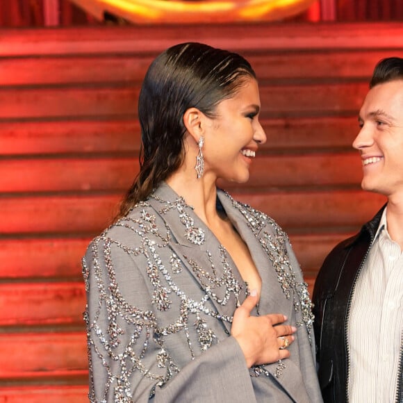 Depuis qu'ils ont tourné ensemble dans Spider-Man...
Photo 05/12/21 de Zendaya et Tom Holland lors d'un photocall pour leur nouveau film, Spider-Man : No Way Home, à The Old Sessions House, Londres.