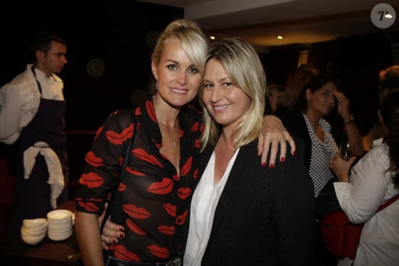 Laeticia Hallyday et Luana Belmondo assistant à la présentation du livre d'Hélène Darroze 'Les Recettes de mes Grands-Meres' au restaurant Hélène Darroze, Rue D'Assas à Paris, France le 20 octobre 2014. Photo par Jerome Domine/ABACAPRESS.COM