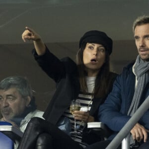 Richard Gasquet et sa compagne Clementine dans les tribunes lors de la demi-finale de la Coupe du Monde de Rugby opposant l'Argentine à la Nouvelle Zélande (6 - 44) au Stade de France à Saint-Denis, France, le 20 octobre 2023. © Cyril Moreau/Bestimage