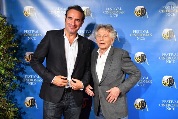 Jean Dujardin et Roman Polanski durant la soirée de clôture de la 1ere édition du Festival Ciné Roman à Nice le 26 octobre 2019. Pour cette soirée de clôture, c'est le film "J'accuse" réalisé pas R.Polanski d'après le roman de Robert Harris qui a sera projeté. Le film récompensé est "Celle que vous croyez", réalisé par S.Nebbou, le prix Ferret a récompensé la comédienne et réalisatrice N.Garcia et R.Polanski a reçu un prix pour l'ensemble de sa carrière. Cette manifestation a eu lieu du 23 au 26 octobre 2019. Tout en marquant la fin de l'année du Cinéma à Nice, elle deviendra pérenne et marquera une nouvelle avancée dans la présence de la Ville au niveau culturel international. Comme son nom l'indique, le festival Ciné Roman consiste à organiser un festival qui présente des films tirés de roman à travers différentes programmations (films en compétitions, avant-premières, films cultes) mais aussi des débats, masterclass et lectures. Daniel et Nathalie Benoin, Carole Chrétiennot et Christophe Barratier, les organisateurs de ce Festival souhaitent qu'il donne lieu à des rencontres entre auteurs, éditeurs, réalisateurs-producteurs et surtout bien sûr avec le public. © Bruno Bebert / Bestimage 