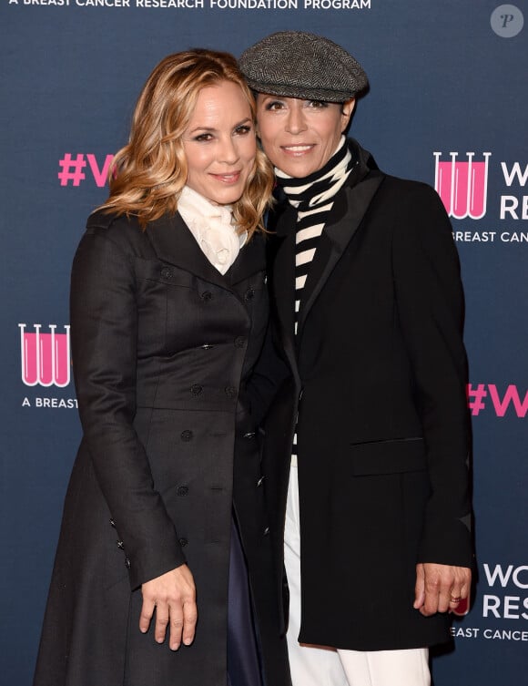 Maria Bello et sa fiancée Dominique Crenn au photocall de la soirée "Women's Cancer Research Fund" à Los Angeles, le 27 février 2020.