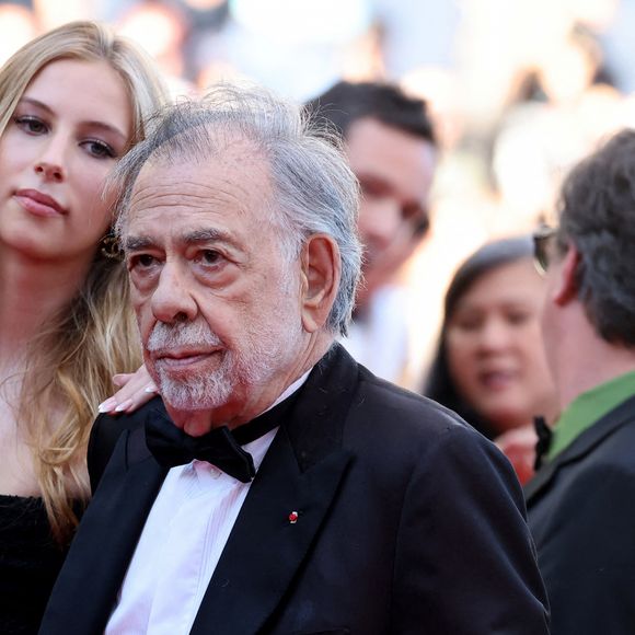 Ce film en compétition a été réalisé par son grand-père, Francis Ford Coppola.
Romy Croquet et son grand-père Francis Ford Coppola à la montée des marches du 77ᵉ Festival International du Film de Cannes, au Palais des Festivals à Cannes. Le 16 mai 2024 © Olivier Borde / Bestimage