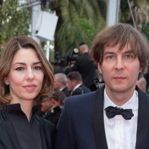 Sofia Coppola (membre du jury) et son mari Thomas Mars - Montée des marches du film " Saint Laurent" lors du 67 ème Festival du film de Cannes – Cannes le 17 mai 2014.