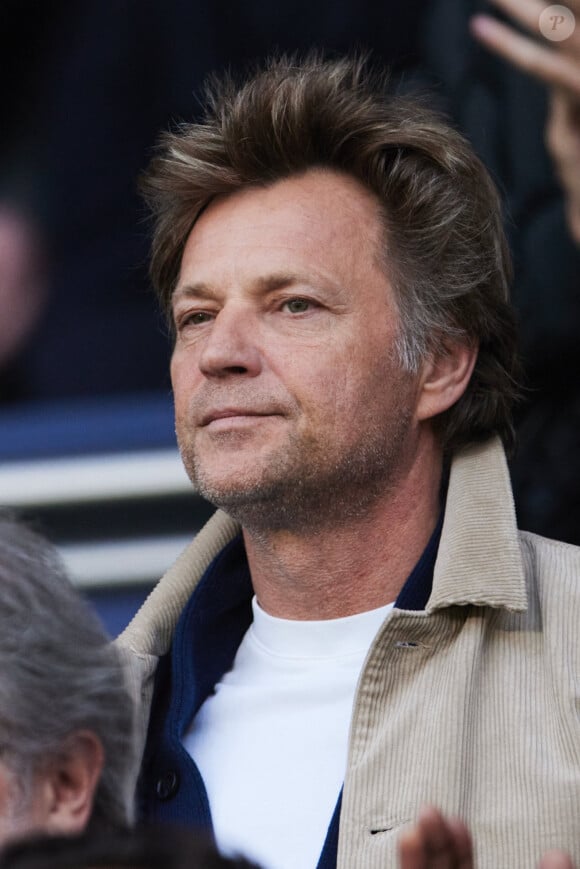 Laurent Delahousse - Célébrités dans les tribunes de la demi-finale retour de Ligue des champions entre le PSG face au Borussia Dortmund (0-1) au Parc des Princes à Paris le 7 mai 2024. © Cyril Moreau/Bestimage 