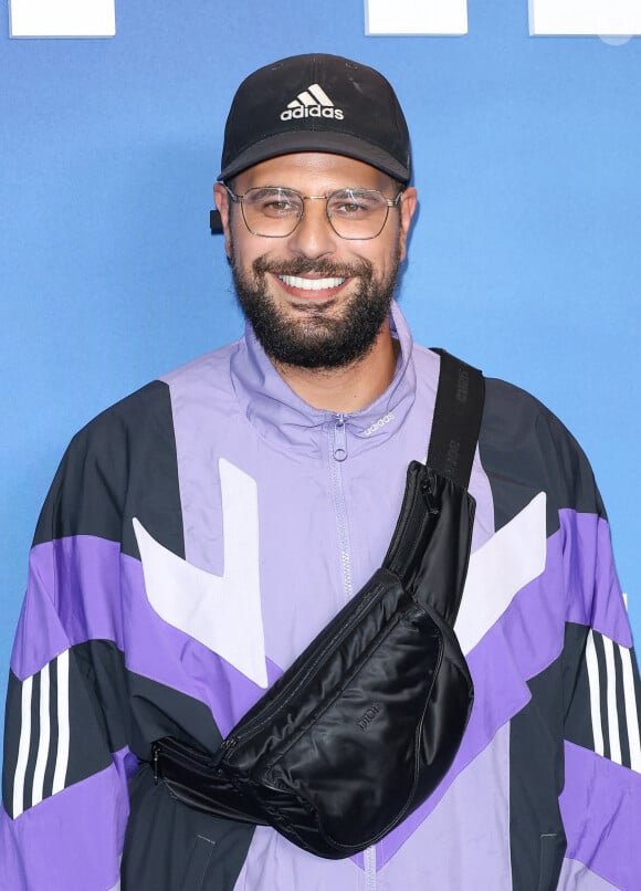 Hakim Jemili s'est confié sur sa famille. 
Hakim Jemili - Avant-première Netflix de la série "Tapie" à l'UGC Normandie Paris. © Coadic Guirec/Bestimage