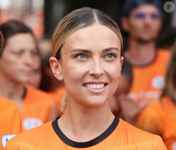 Inès Vandamme (danseuse) lors du marathon Orange Night Run, une boucle de 5,274 km le long des quais de Seine, pour tenter de remporter l'un des 1000 dossards pour le Marathon Pour Tous des Jeux Olympiques de Paris 2024, à Paris, France, le 17 juin 2023. © Jonathan Rebboah/Panoramic/Bestimage 