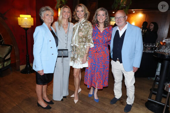 Sylvie Tellier avec sa mère Annick, ses soeurs Stephanie et Anne-Sophie, son beau-père Eric lors de la soirée de Sylvie Tellier pour son 46e anniversaire mais aussi le lancement de son livre "Couronne et préjugés", organisée par Five Eyes Production au Buddha Bar à Paris, le 28 mai 2024. Photo by Jerome Dominé/ABACAPRESS.COM