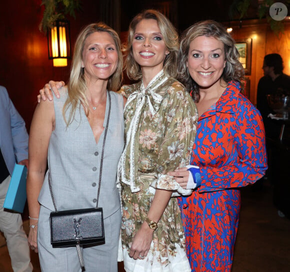 Sylvie Tellier et ses soeurs Stephanie et Anne-Sophie lors de la soirée de Sylvie Tellier pour son 46e anniversaire mais aussi le lancement de son livre "Couronne et préjugés", organisée par Five Eyes Production au Buddha Bar à Paris, le 28 mai 2024. Photo by Jerome Dominé/ABACAPRESS.COM