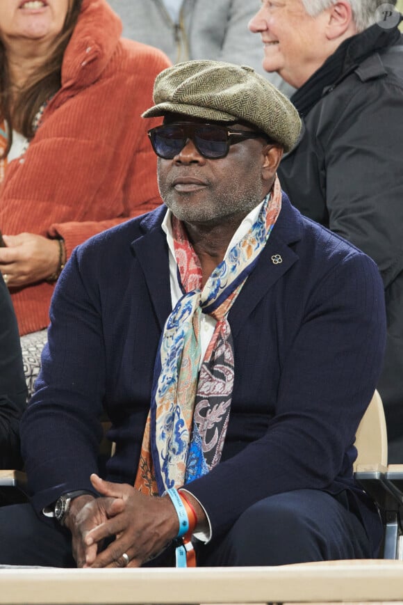 Basile Boli dans les tribunes des Internationaux de France de tennis de Roland Garros 2024 à Paris, France, le 31 mai 2024. © Jacovides-Moreau/bestimage 