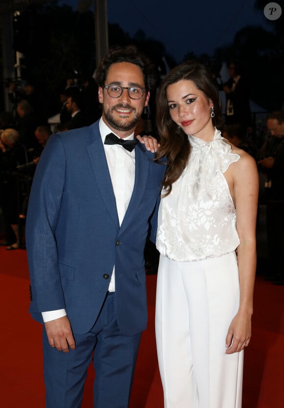 Thomas Hollande et sa femme Emilie Broussouloux - Montée des marches du film "R.M.N." lors du 75ème Festival International du Film de Cannes, le 21 mai 2022. © Dominique Jacovides / Bestimage