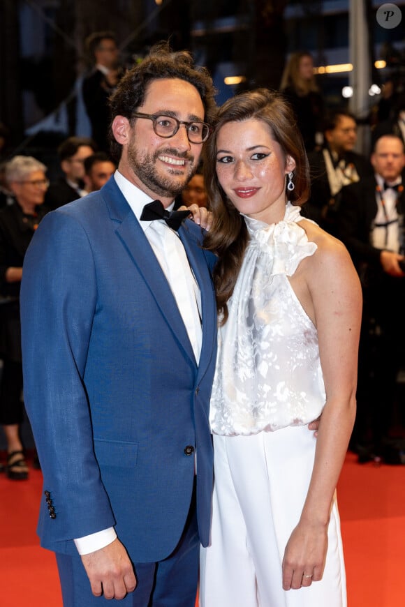 Thomas Hollande, sa femme Emilie Broussouloux - Montée des marches du film "R.M.N." lors du 75ème Festival International du Film de Cannes, le 21 mai 2022. © Cyril Moreau / Bestimage