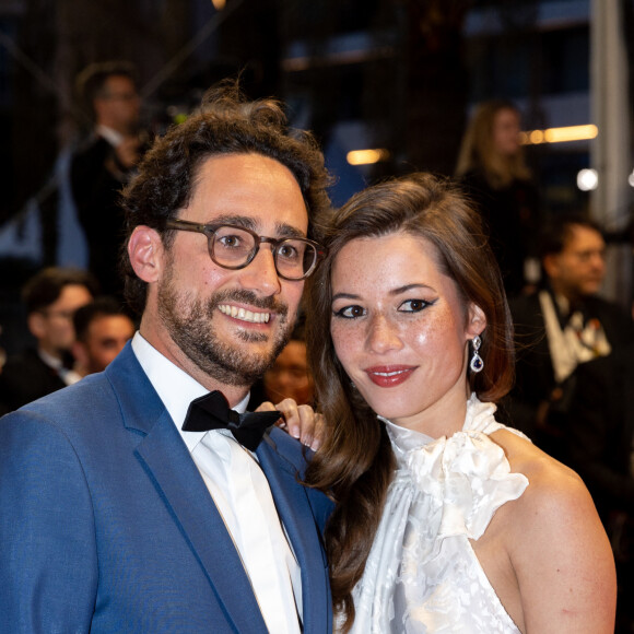 Thomas Hollande, sa femme Emilie Broussouloux - Montée des marches du film "R.M.N." lors du 75ème Festival International du Film de Cannes, le 21 mai 2022. © Cyril Moreau / Bestimage