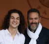 Avec son fils Noé, il est allé à Roland-Garros
Noé Toussaint et son père Bruce Toussaint - Les célébrités au village lors des Internationaux de France de tennis de Roland Garros 2024 à Paris. Le 5 juin 2024. © Jacovides-Moreau/Bestimage 