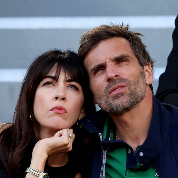 Nolwenn Leroy et son compagnon Arnaud Clément - Célébrités dans les tribunes des Internationaux de France de tennis de Roland Garros 2024 à Paris le 7 juin 2024. © Jacovides-Moreau/Bestimage 