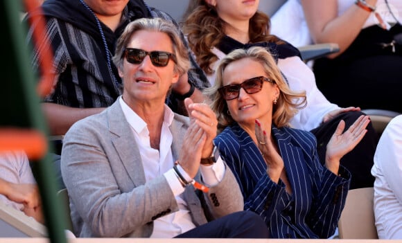 Laurent Solly (président de Facebook France) et sa femme Caroline Roux - Célébrités dans les tribunes des Internationaux de France de tennis de Roland Garros 2024 à Paris le 7 juin 2024. © Jacovides-Moreau/Bestimage 