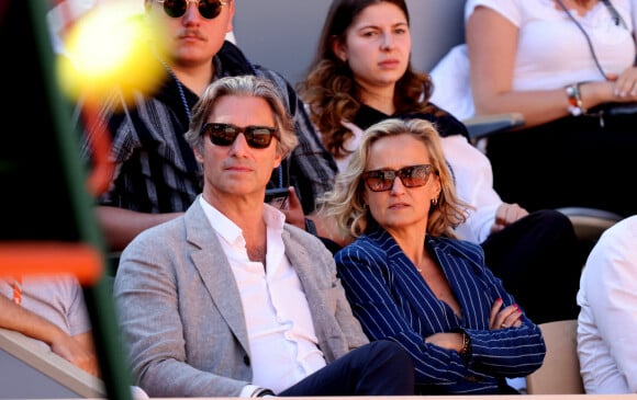 Laurent Solly (président de Facebook France) et sa femme Caroline Roux - Célébrités dans les tribunes des Internationaux de France de tennis de Roland Garros 2024 à Paris le 7 juin 2024. © Jacovides-Moreau/Bestimage 