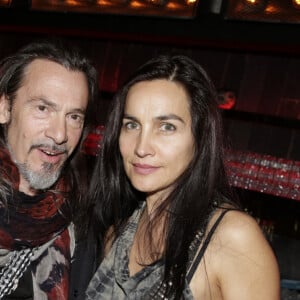 Florent Pagny, accompagné de sa femme Azucena, reçoit un disque de diamant pour son album "Vieillir avec toi" au Titty Twister à Paris, le 1er octobre 2014. Jérôme Domine/ABACAPRESS.COM