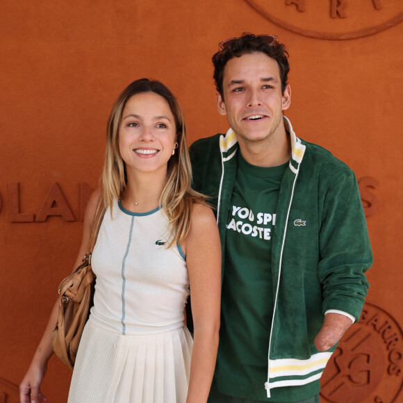 Théo Curin et sa compagne Marie-Camille Fabas - Célébrités au village lors des Internationaux de France de tennis de Roland Garros 2024 à Paris le 9 juin 2024.  Celebrities in the village during the 2024 Roland Garros French Open tennis tournament in Paris on June 9, 2024.