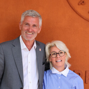 Gilles Moretton et sa femme Christine - Célébrités au village lors des Internationaux de France de tennis de Roland Garros 2024 à Paris le 9 juin 2024.  Celebrities in the village during the 2024 Roland Garros French Open tennis tournament in Paris on June 9, 2024.