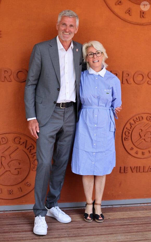 Gilles Moretton et sa femme Christine - Célébrités au village lors des Internationaux de France de tennis de Roland Garros 2024 à Paris le 9 juin 2024.  Celebrities in the village during the 2024 Roland Garros French Open tennis tournament in Paris on June 9, 2024.