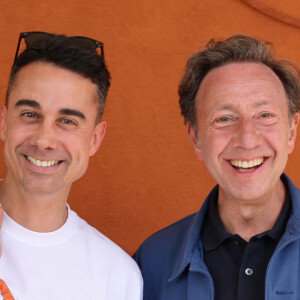 Stéphane Bern et son compagnon Yori Bailleres - Célébrités au village lors des Internationaux de France de tennis de Roland Garros 2024 à Paris le 9 juin 2024.  Celebrities in the village during the 2024 Roland Garros French Open tennis tournament in Paris on June 9, 2024.