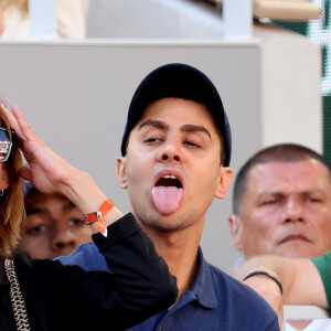 Sophie Marceau, Djanis Bouzyani - Célébrités dans les tribunes de la finale homme des Internationaux de France de tennis de Roland Garros 2024 à Paris le 9 juin 2024. © Jacovides-Moreau/Bestimage 