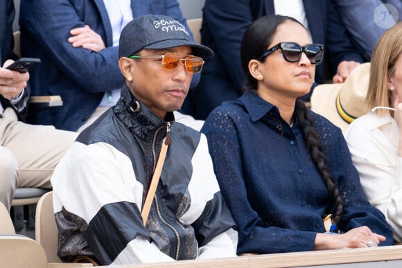 L'artiste et sa femme ont donc posé leurs valises et habitent à Paris.
Pharrell Williams et Helen Lasichanh assistent aux Internationaux de France 2024 à Roland Garros le 9 juin 2024 à Paris, France. Photo par Laurent Zabulon/ABACAPRESS.COM