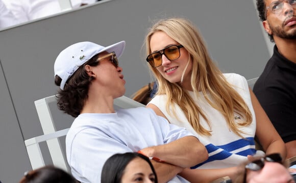 Sandor Funtek et sa compagne Chloé Jouannet dans les tribunes des Internationaux de France de tennis de Roland Garros 2024 à Paris, le 4 juin 2024. © Jacovides-Moreau/Bestimage