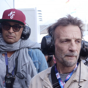 Mathieu Kassovitz et Yannick Noah lors des "24H du Mans 2024", le 15 juin 2024. © Rachid Bellak/Bestimage